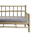 Sofá de bambú con respaldo cuadriculado y colchoneta de algodón gris