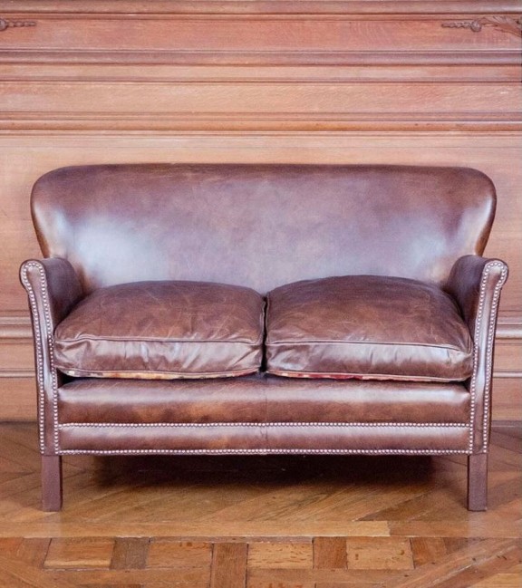 Pequeño sofá cuero antique